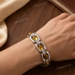 Dhan Yog Bracelet worn on wrist with Tiger Eye, Pyrite, Citrine, Quartz and Green Aventurine